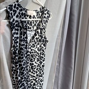 Black and white tie front sleeveless blouse